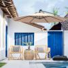 imageGiantex 10ft Offset Patio Umbrella Beige Outdoor Hanging Market Umbrella with Crank amp Cross Base Easy Tilt Adjustment 96 Sunlight ProtectionBeige
