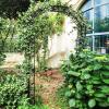 imageGiantex Metal Garden Arbor 75 FT Heavy Duty Arch Trellis for Climbing Plants Decorative Outdoor Garden Archway with Pointed Legs Wedding Arbor for Party Backyard Lawn Ceremony Decoration59W x 99H